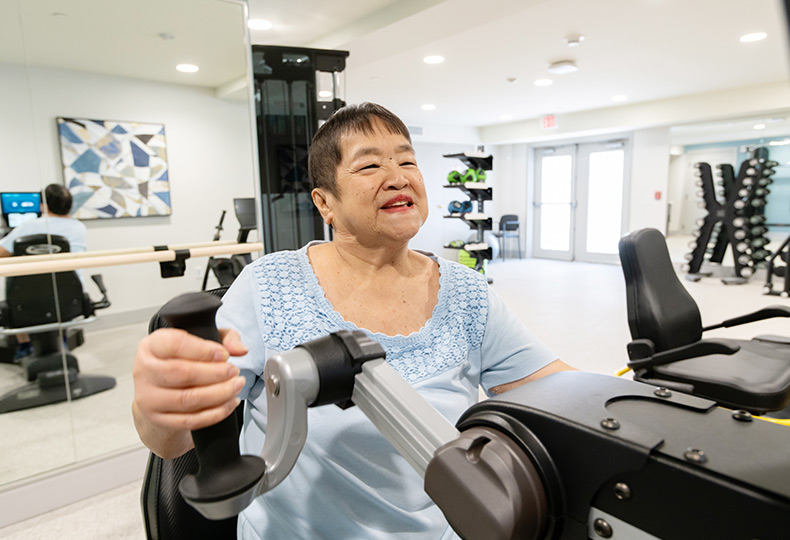 A person working out at the fitness center.