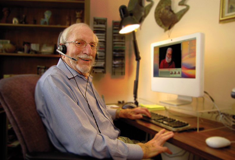 A resident is on a computer.