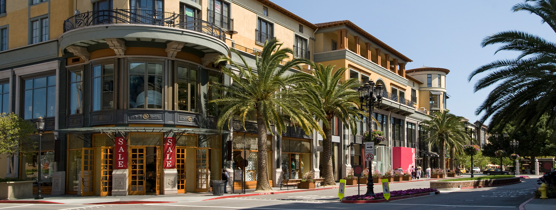 Store fronts on a street.