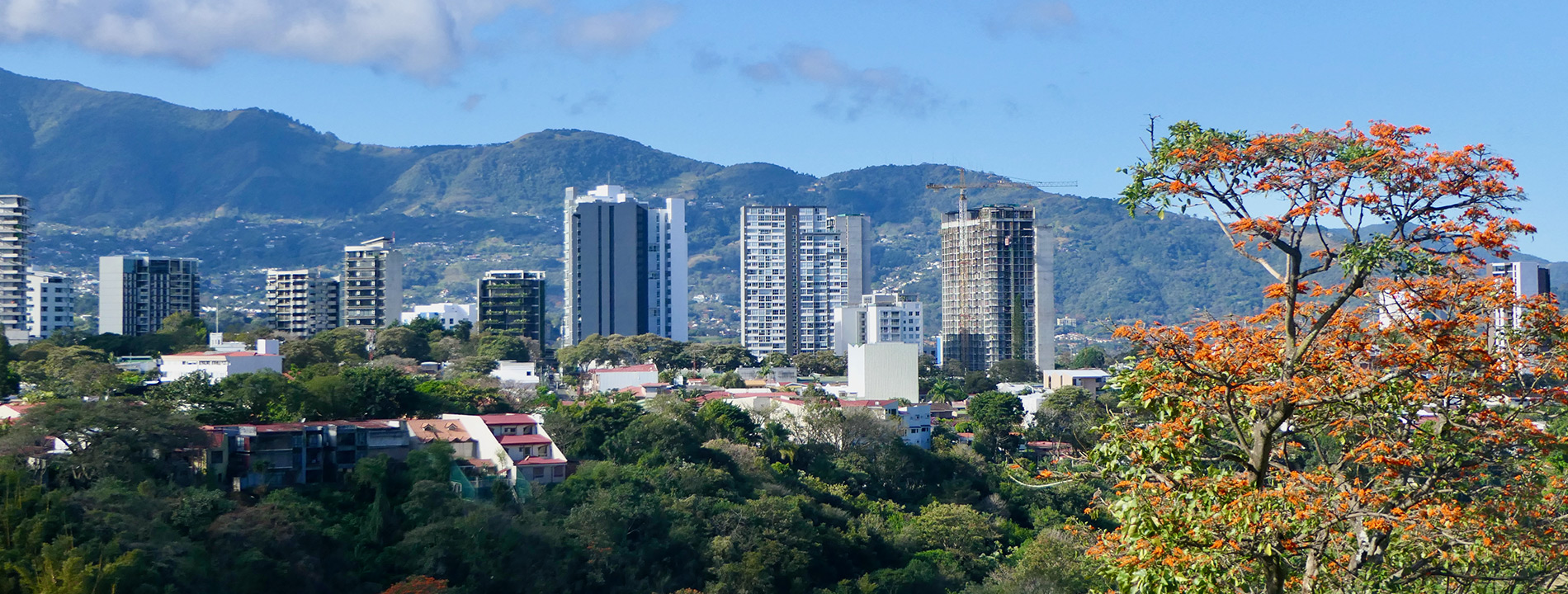 A view of San Jose with mountains in the back.