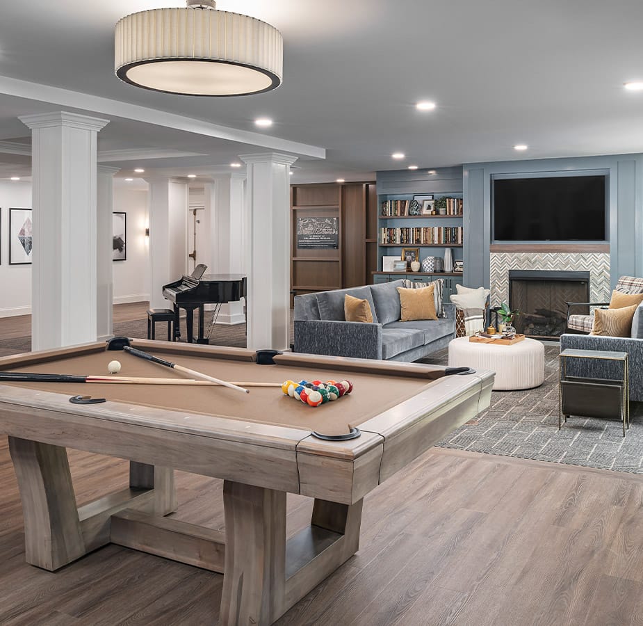 A game room and lounge at The Watermark at St. Peters.