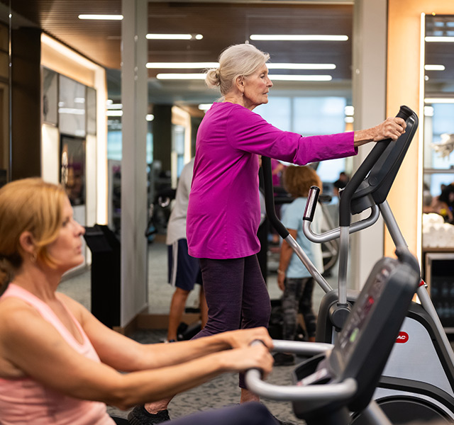 People working out at the gym.