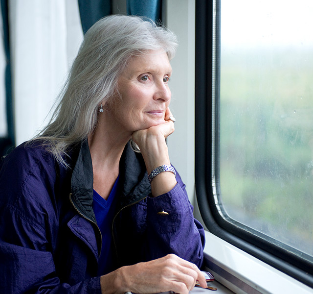 A resident is on a train.