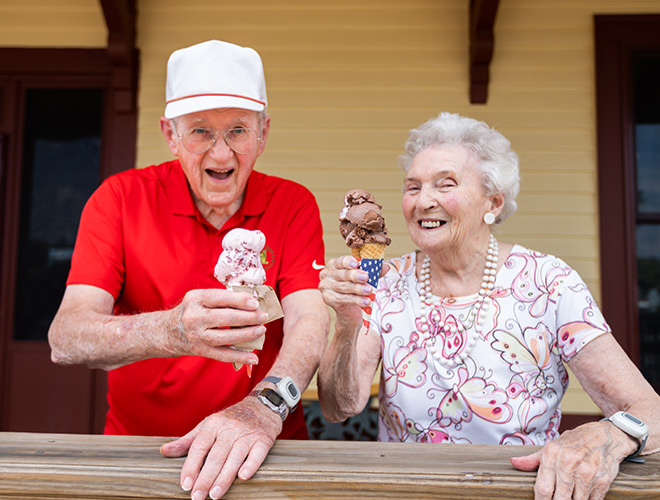 Two residents are having ice cream.