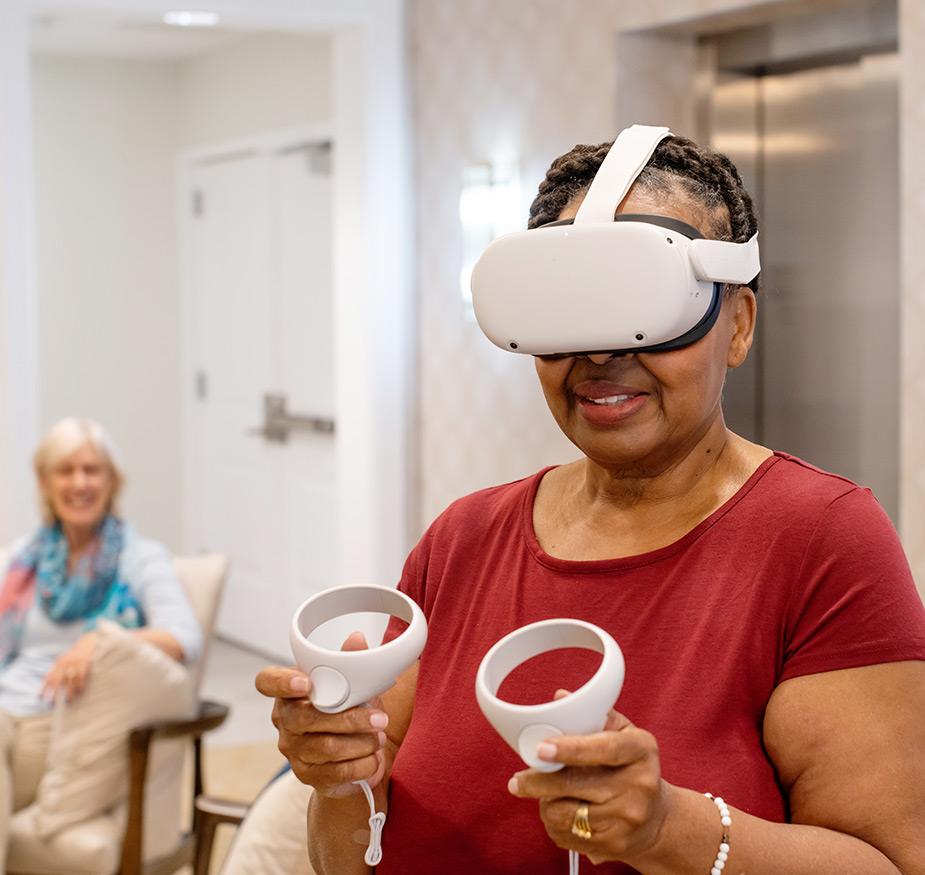 A person playing with a VR headset.