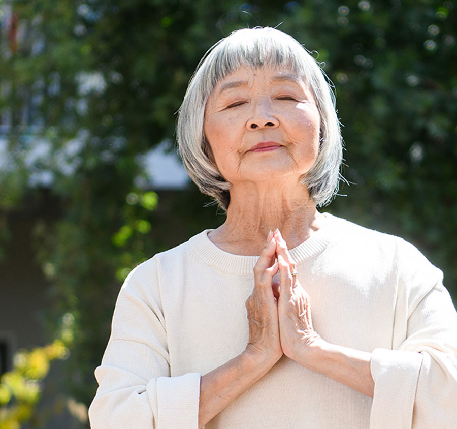 A resident enjoying yoga.