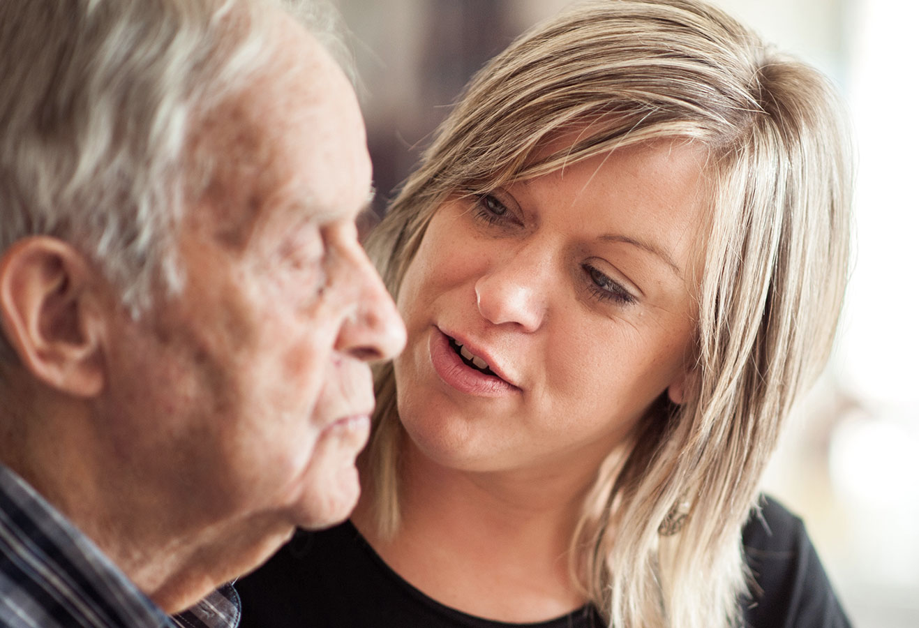 A resident with their caregiver.