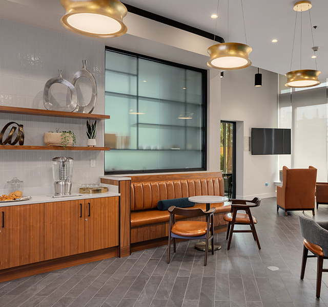 A Bistro cafe with seating and a counter for food.
