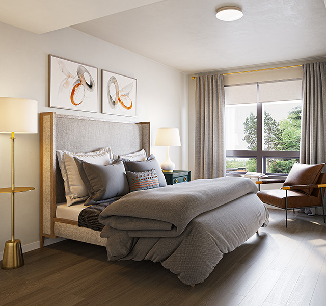 A fully furnished bedroom with a large window.