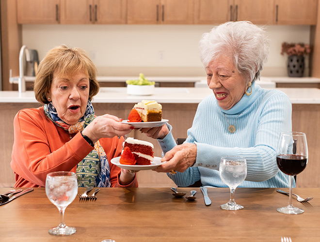 Residents swapping desserts.