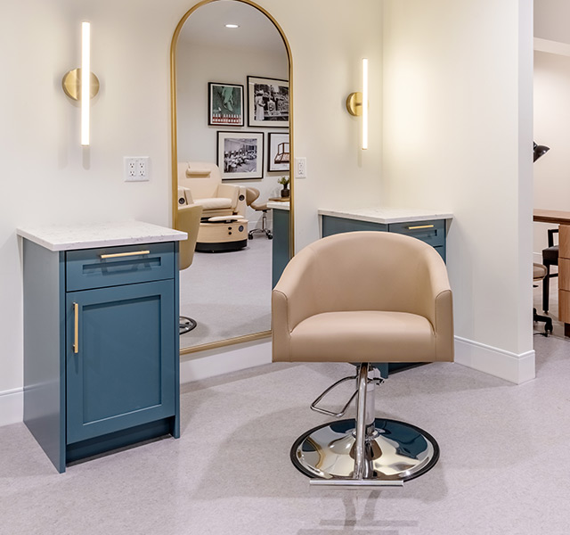 Indulge Salon with a chair and mirror.