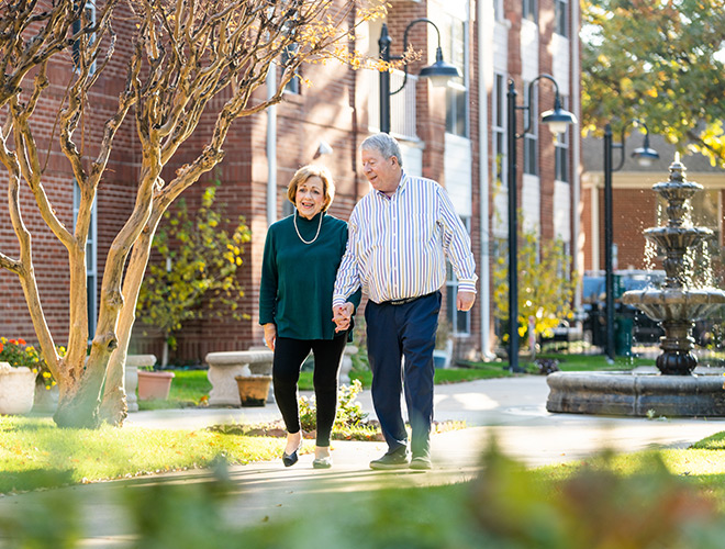 Residents walking in the courtyard.
