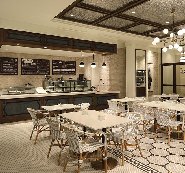 The gallery cafe with chalk board wall menus and seating.