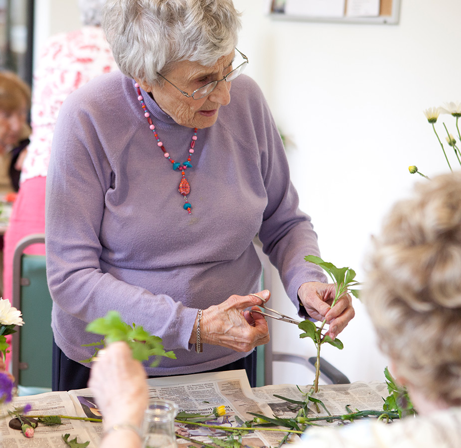 A person arranging flowers.