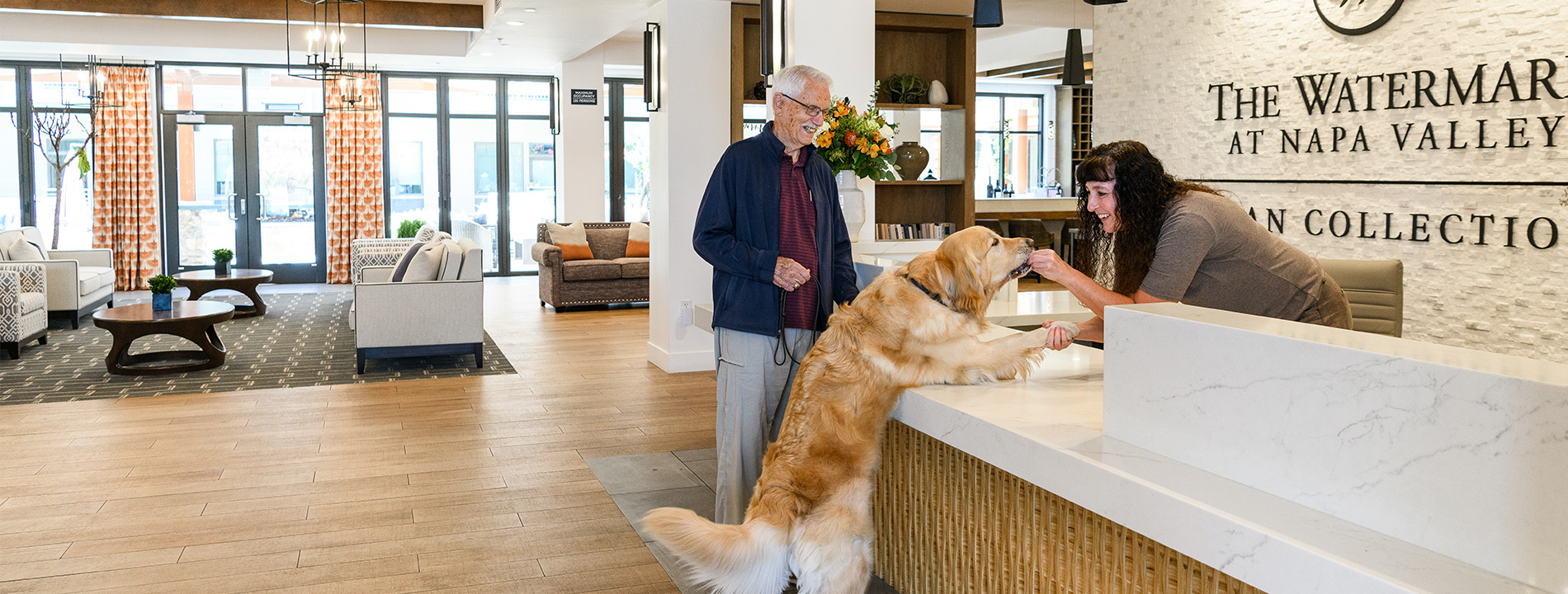 A resident is at the lobby in The Watermark at Napa Valley.