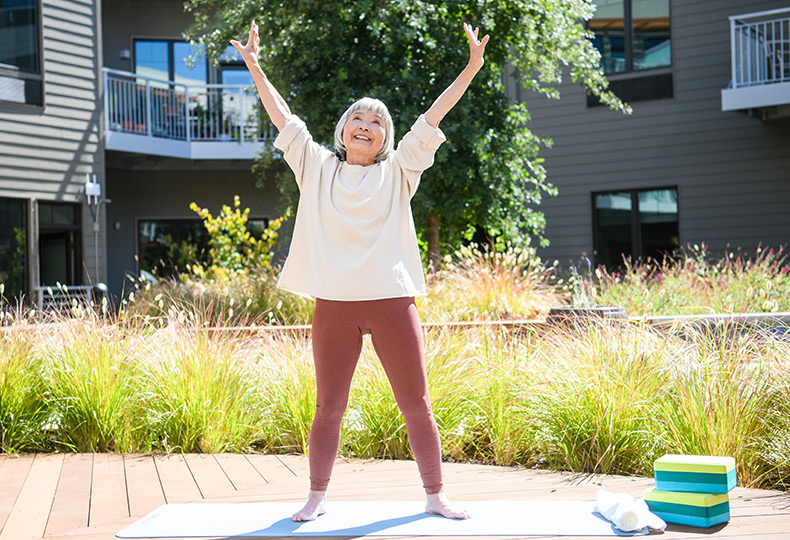 A resident is practicing yoga.