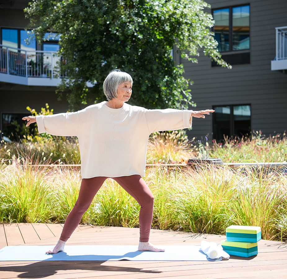 A resident is practicing yoga.