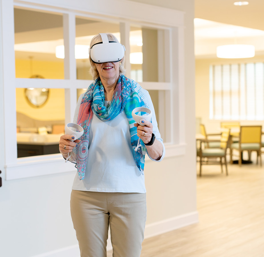 A person playing with a VR headset.