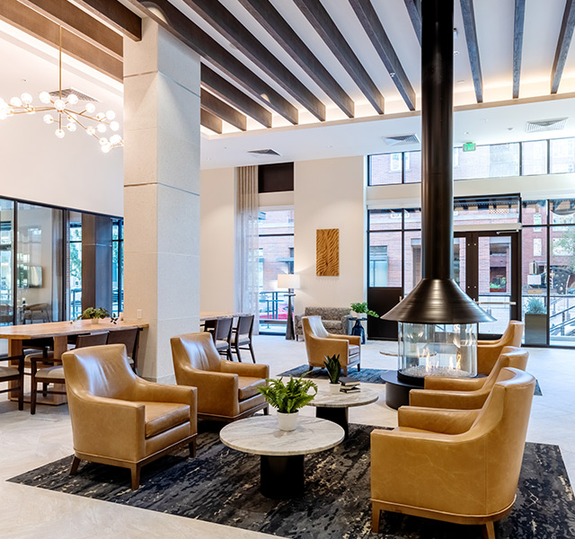 The lobby area with seating and a fireplace.