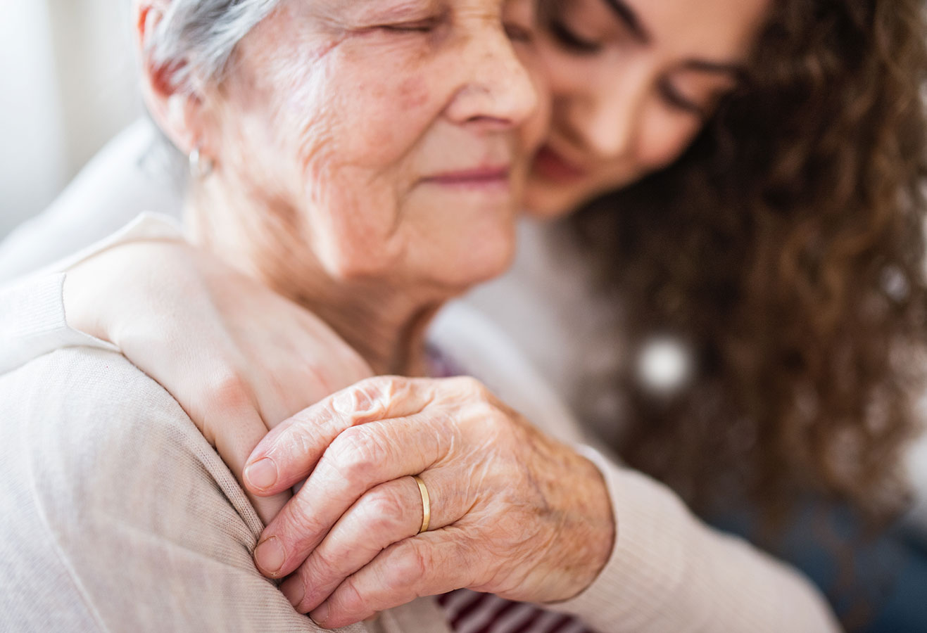 A resident with their caregiver.