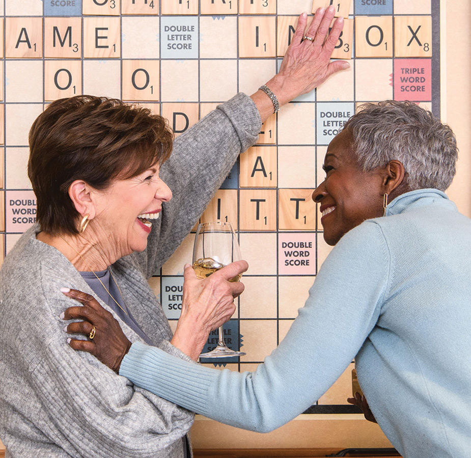 Couple play game of scrabble.