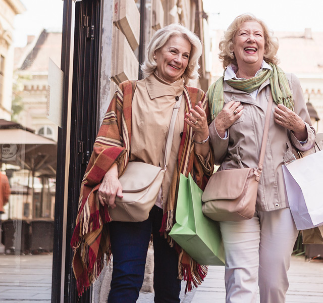 Happy residents shopping.