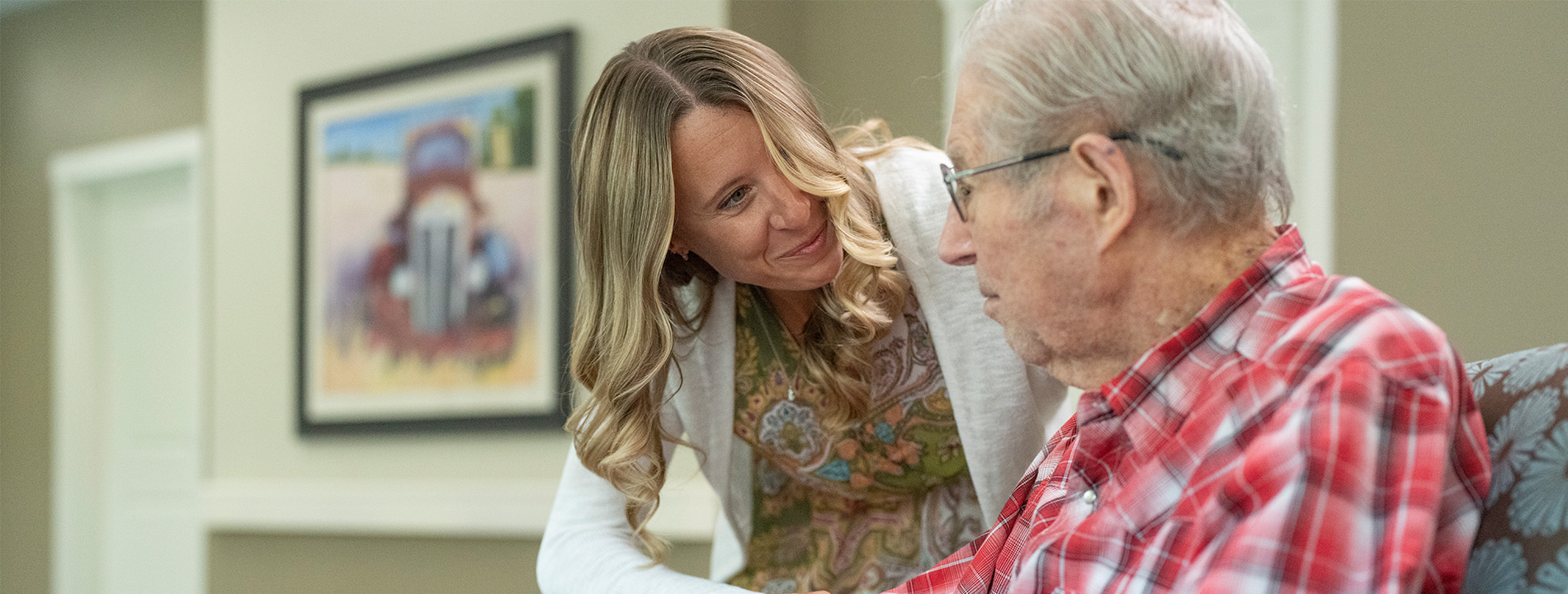 A caregiver with a resident.