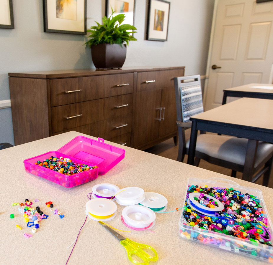 Beading materials on a table at Whittier Place.