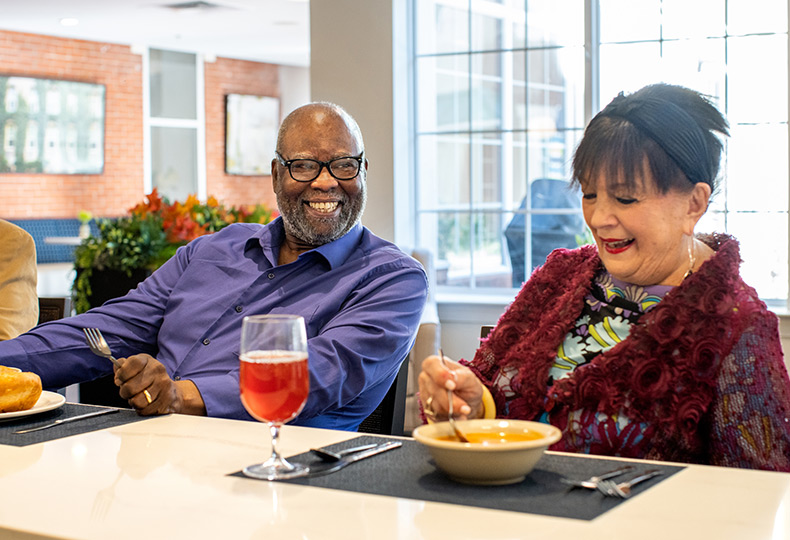 Two residents are dining.