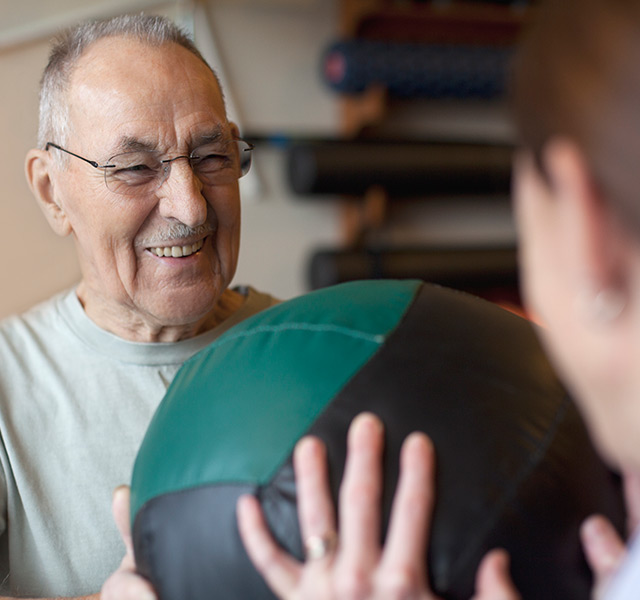 A resident is in a fitness class.
