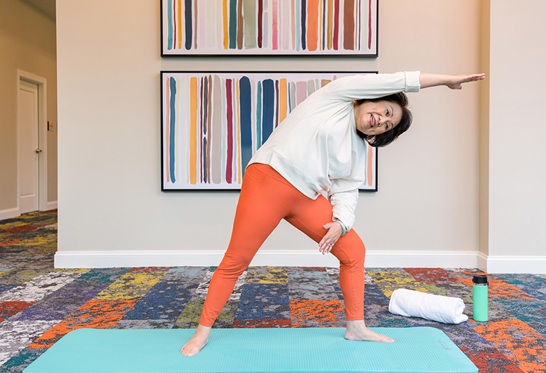 Resident enjoying yoga.