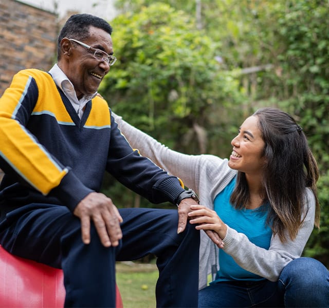 A resident with their caregiver.