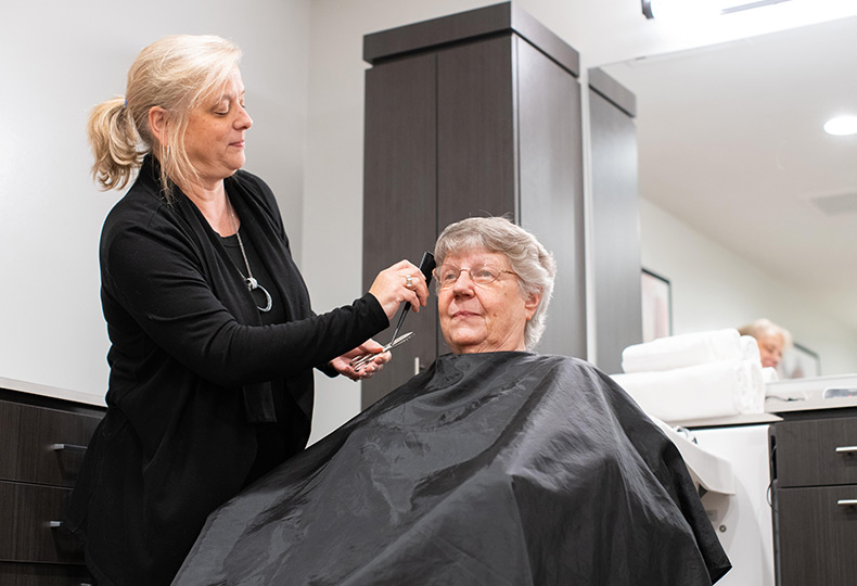 Resident getting hair done at the salon.