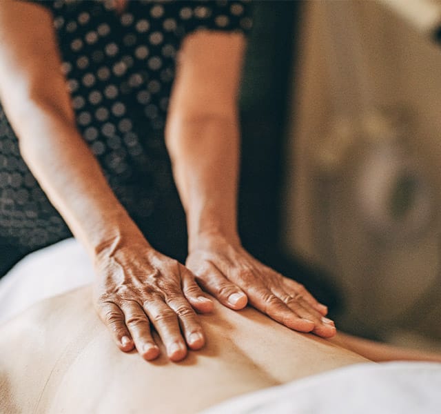 Resident enjoying a massage.