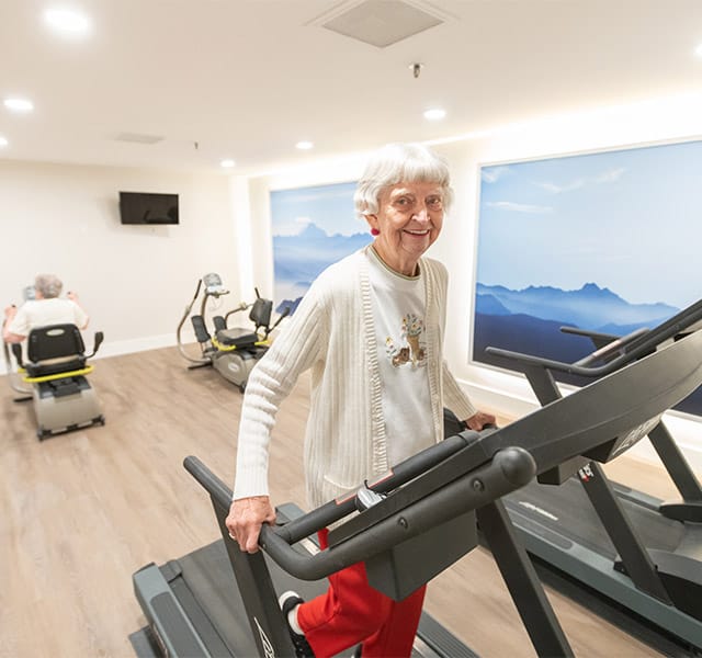 elderly woman on the treadmill