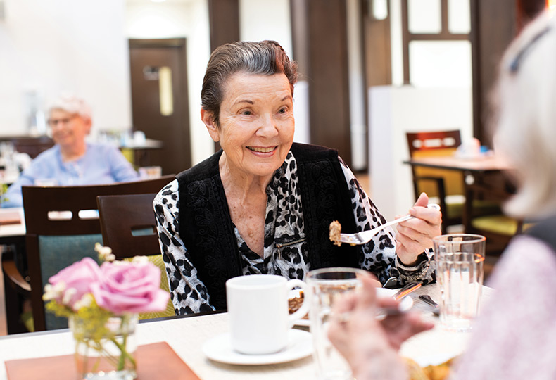 Residents enjoying lunch.