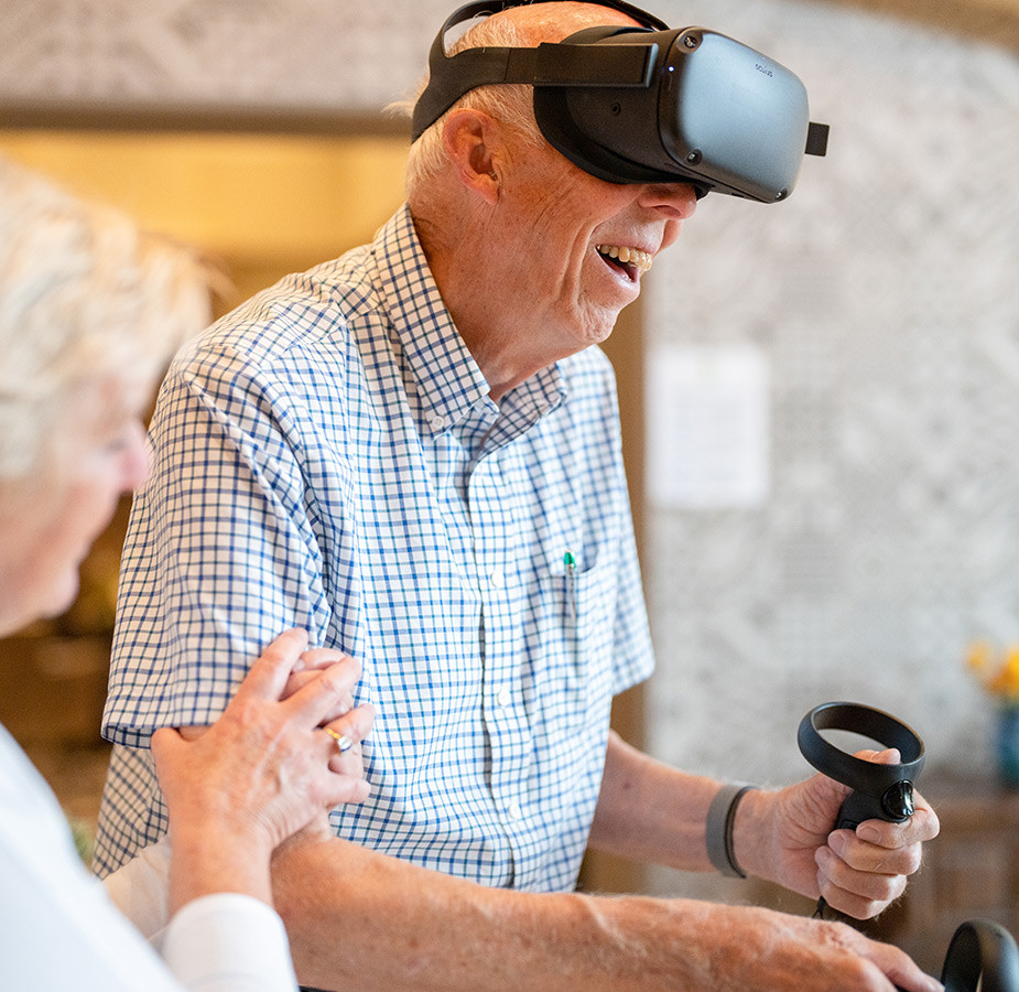 A resident is using an Engage VR set.