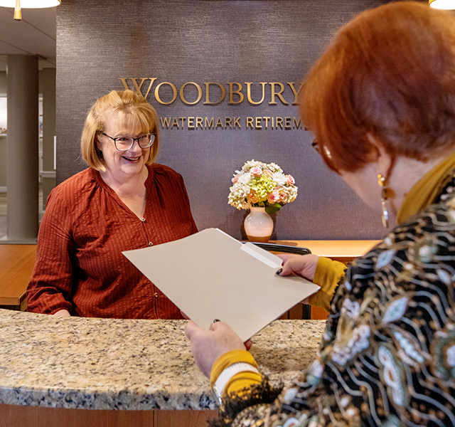 The front desk in the lobby at Woodbury Mews.