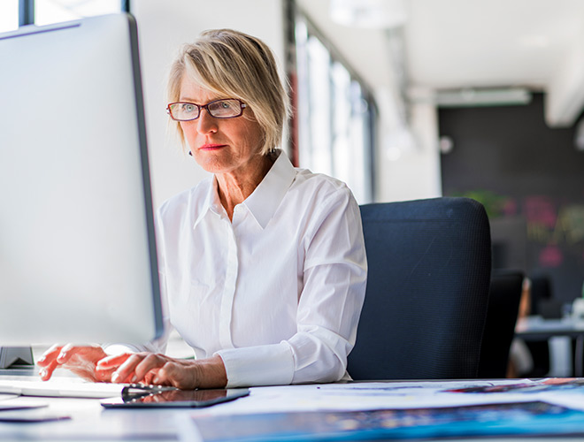 A resident is on a computer.