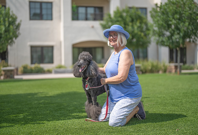 A resident is outside with their dog.