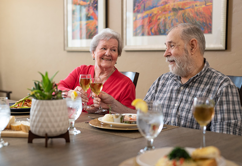 Two residents are having a meal together.