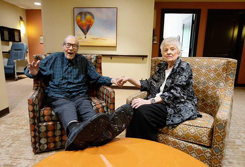 Two residents are sitting next to eachother.