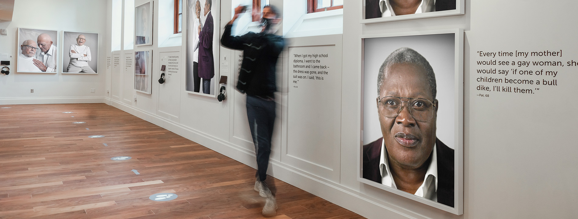 People walking through an exhibit.