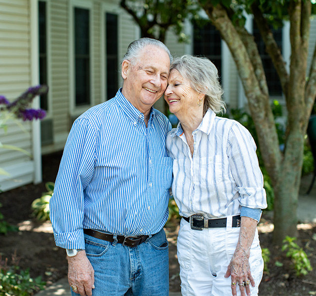 A couple together in the garden.