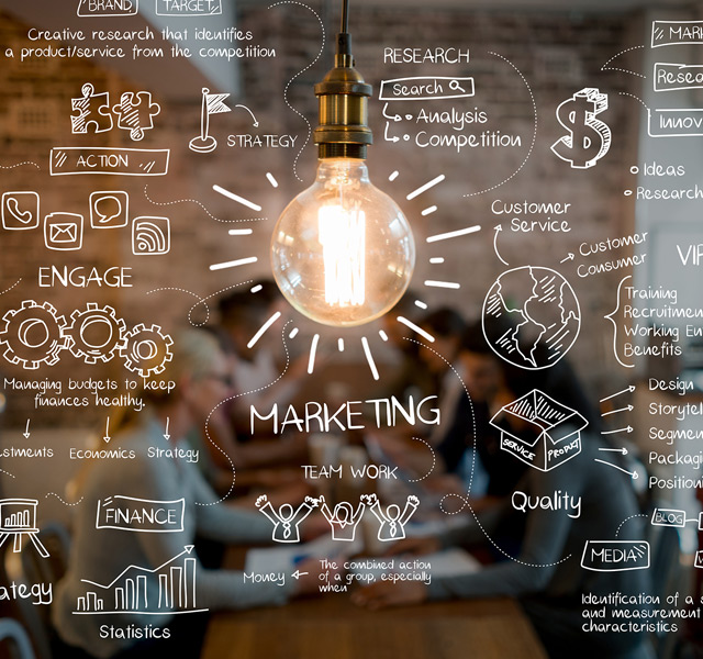 a lightbulb surrounded by marketing writing
