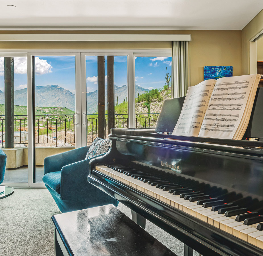 Seating area by piano.