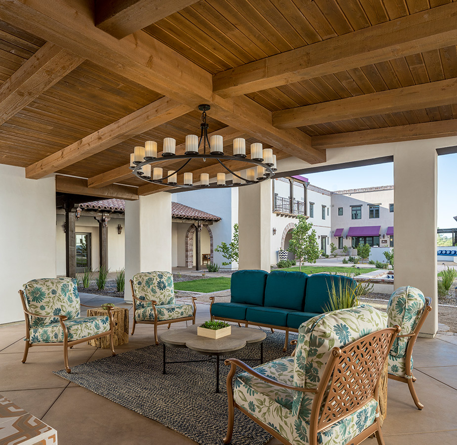 A patio set in a covered patio space at The Hacienda at the River.