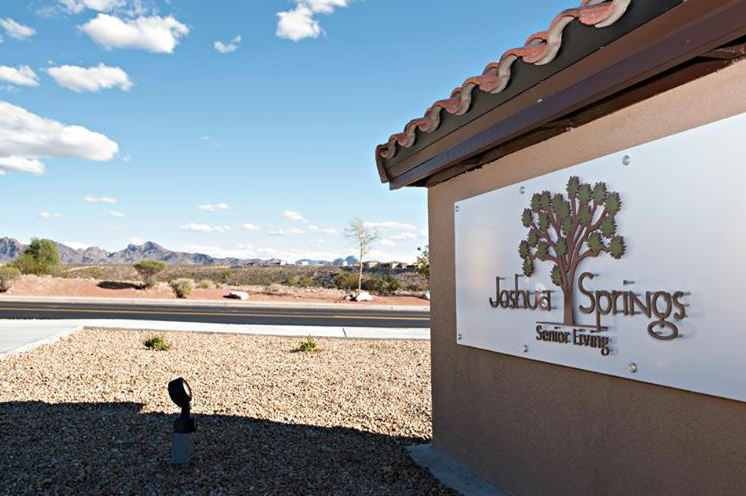 Joshua Springs Senior Living sign at the entrance.