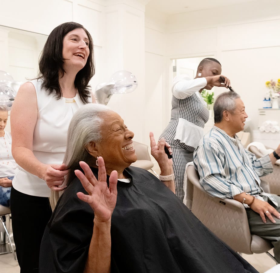 Indulge A resident is having their hair styled at a salon.