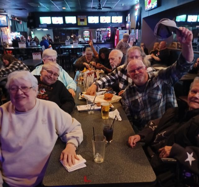GBR-K-640x600-3 Table at a restaurant with happy customers.